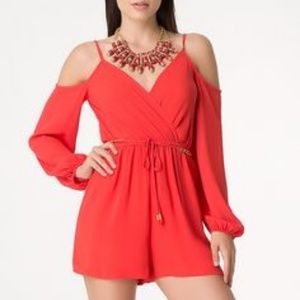 Vibrant  cold shoulder shorts romper from Bebe.